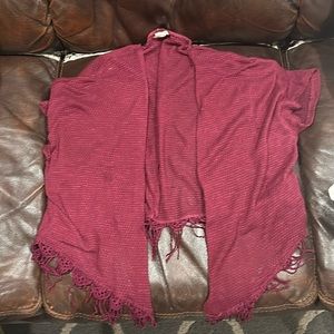 The brand is tru self sizes, large and the color is like maroon